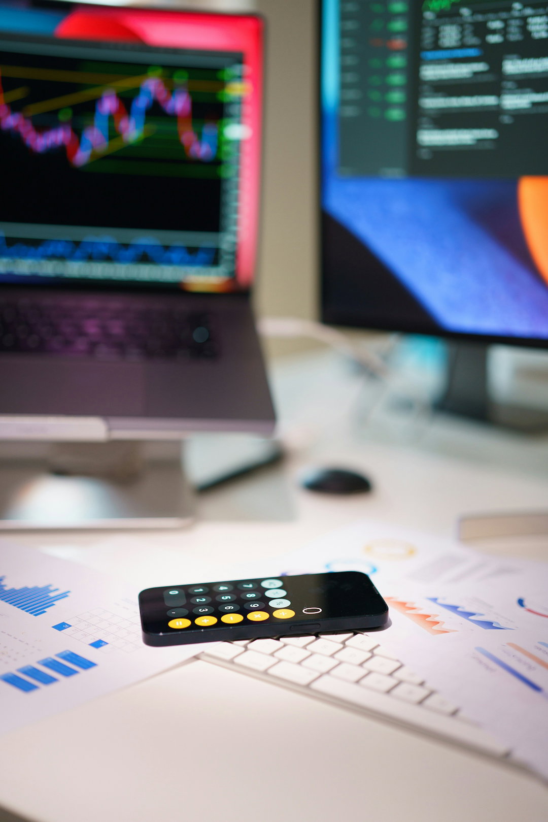 a-remote-control-sitting-on-top-of-a-desk.jpg a remote control sitting on top of a desk